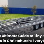 Modern tiny house trailer parked in a scenic Christchurch location with mountains in the background