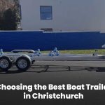 Boat trailer parked at a Christchurch marina with a boat securely loaded