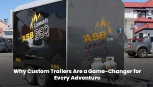 Custom trailer towing through scenic landscape for adventure trips”